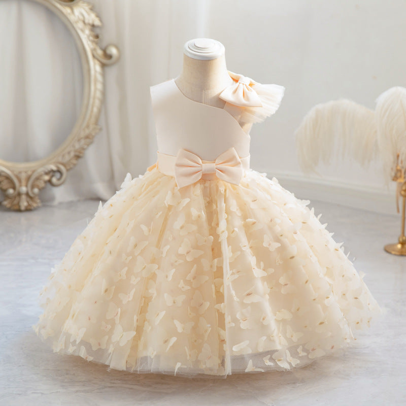Vestido infantil de princesa en color púrpura con detalles en tul y moño, ideal para fiestas y celebraciones.Vestido infantil de princesa – Tul fiesta niña