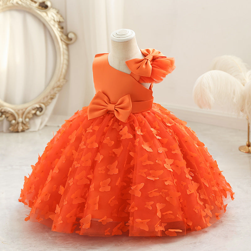 Vestido infantil de princesa en color púrpura con detalles en tul y moño, ideal para fiestas y celebraciones.Vestido infantil de princesa – Tul fiesta niña