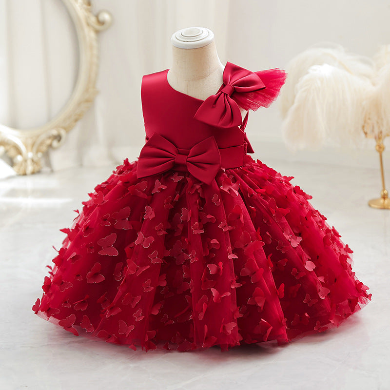 Vestido infantil de princesa en color púrpura con detalles en tul y moño, ideal para fiestas y celebraciones.Vestido infantil de princesa – Tul fiesta niña