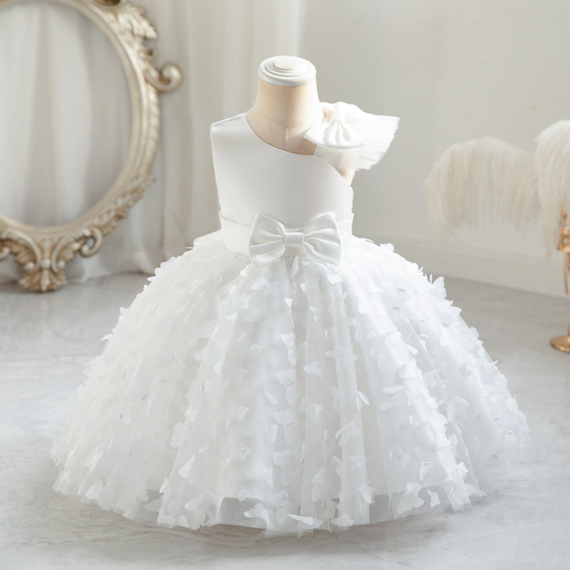Vestido infantil de princesa en color púrpura con detalles en tul y moño, ideal para fiestas y celebraciones.Vestido infantil de princesa – Tul fiesta niña